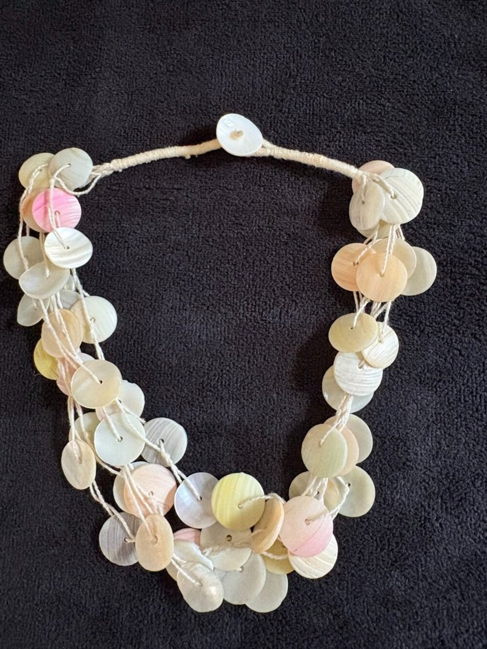 Beaded "button" 16 inch lightweight necklace in shades of ivory and pastels
